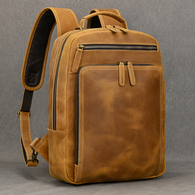 حقيبة ظهر جلدية عصرية للرجال ح - مراجعة Luxury Bags That Fit Laptop وسعره